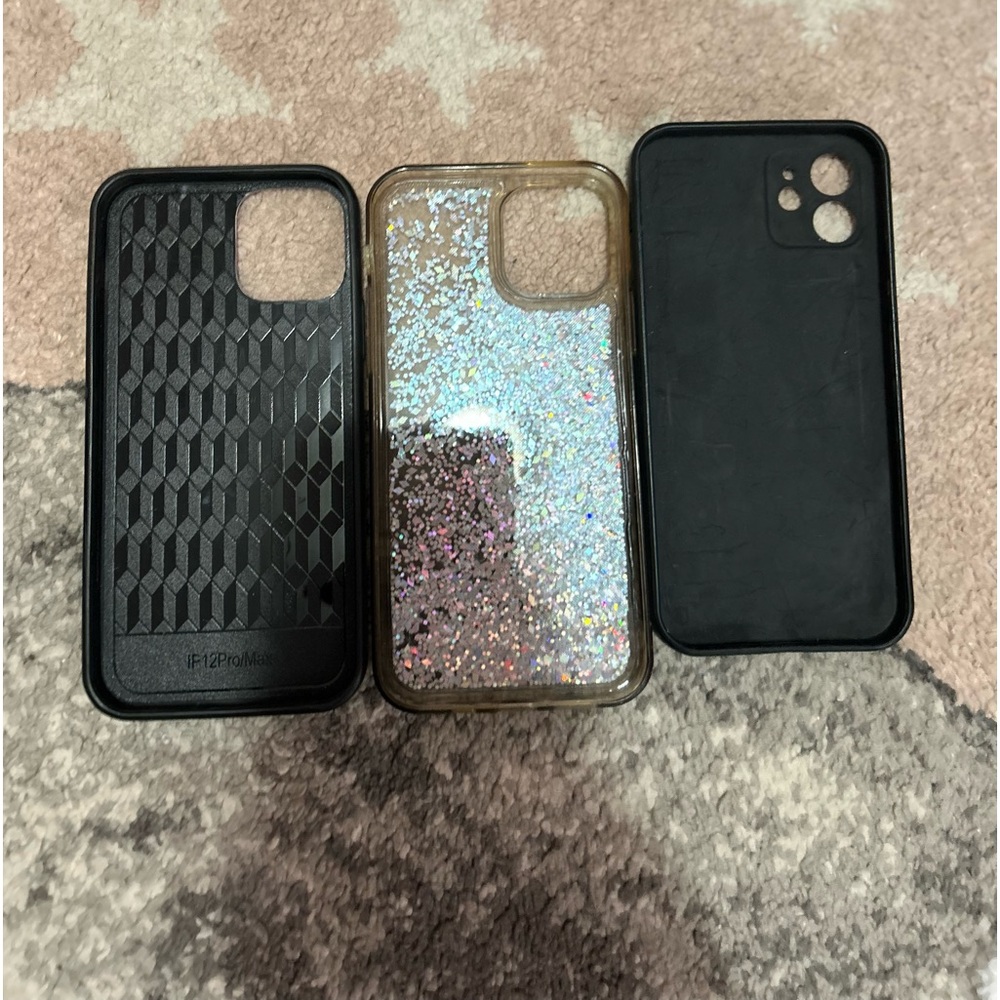 3 iPhone 12s cases. Flower, Glitter, and Heart case.